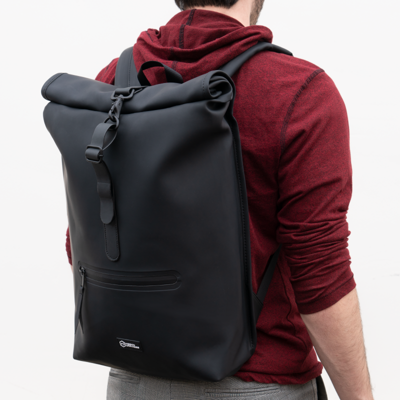 Person wearing a Mission Darkness Freeroam Faraday Backpack.